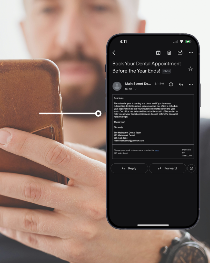 Man looking at a Smartphone. A line connects the smartphone to a graphic of a smartphone displaying an example of a sample email powered by ABELDent Broadcast Messaging. 